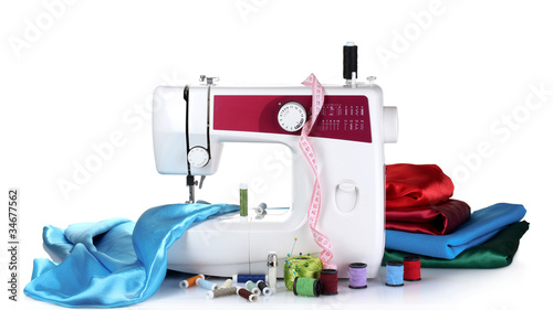 sewing machine and fabric isolated on white