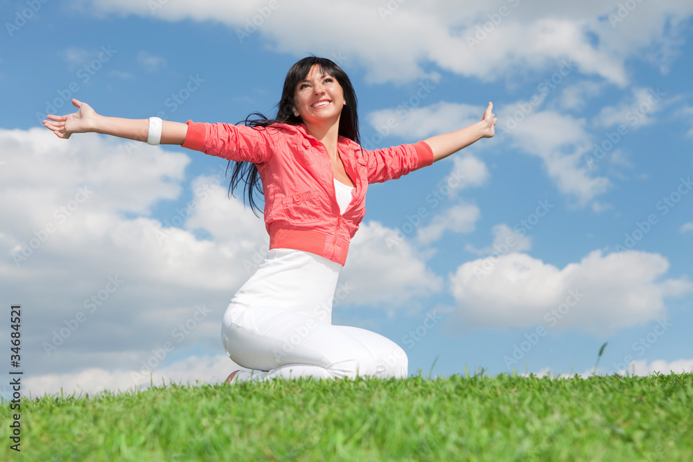 happy young woman on the green grass happy young woman on the green grass