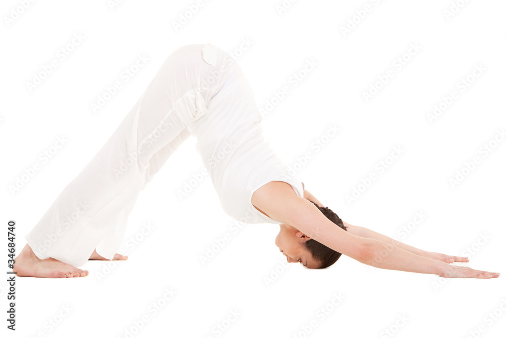 Young woman doing yoga exercise