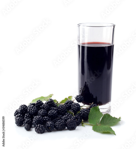 blackberry and glass of juice
