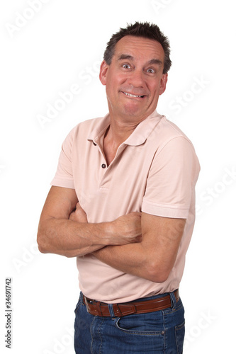 Attractive Man Making Silly Funny Smile with Arms Folded