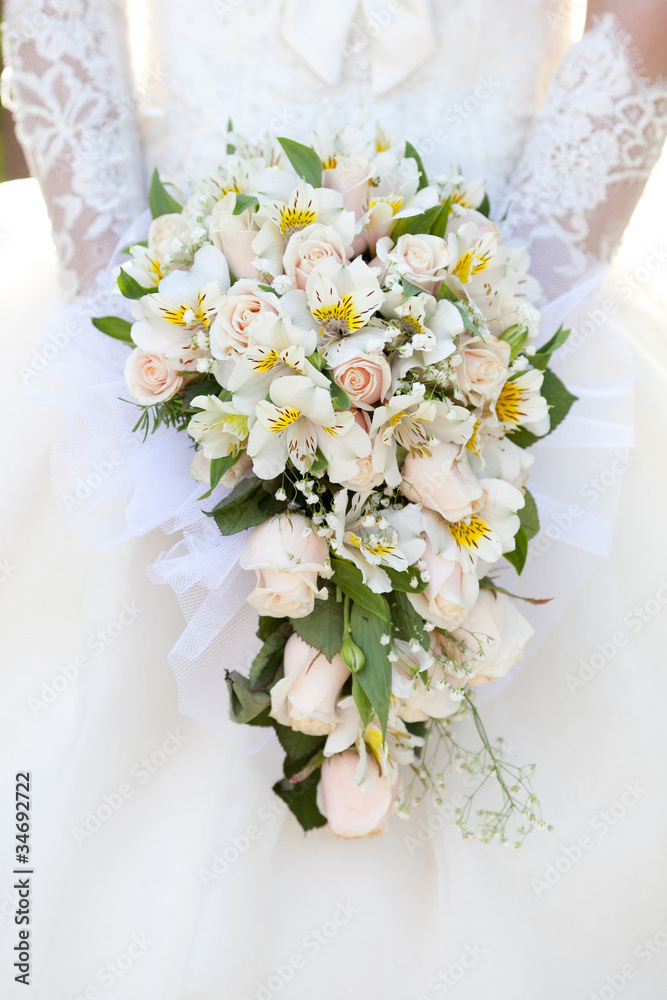 The bride with a wedding bouquet The bride with a wedding bouquet