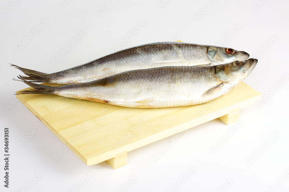 Salted herring isolated on the white background Salted herring isolated on the white background