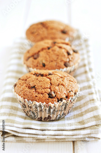 Chocolate muffins in a row