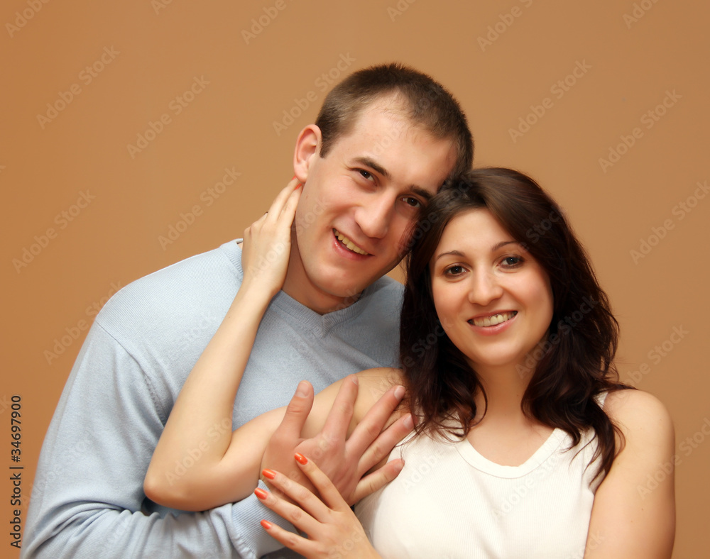 Portrait of a beautiful young happy smiling couple Portrait of a beautiful young happy smiling couple
