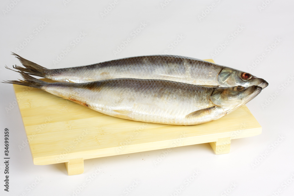 Salted herring isolated on the white background Salted herring isolated on the white background