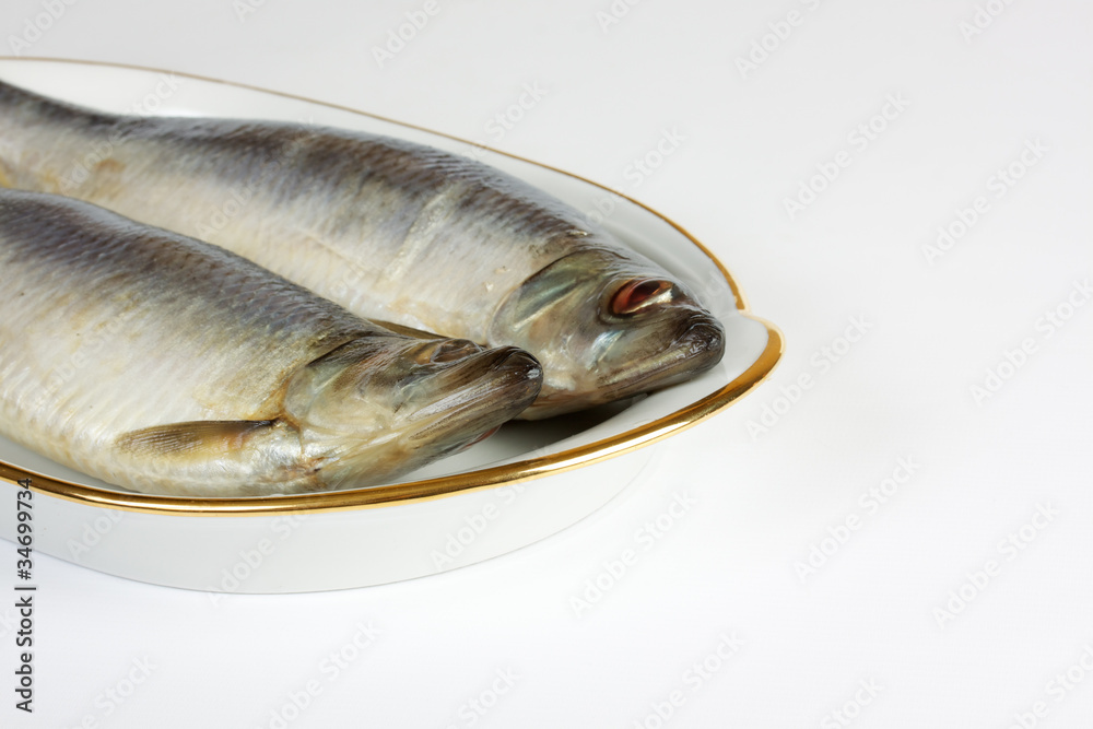Salted herring isolated on the white background Salted herring isolated on the white background