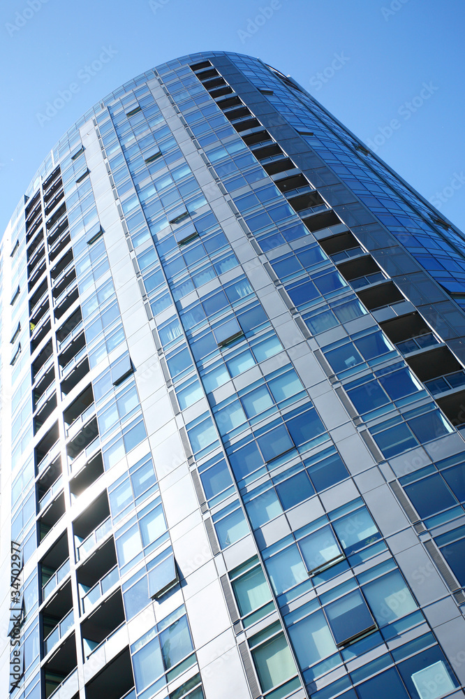 Modern apartment building in the city. Modern apartment building in the city.