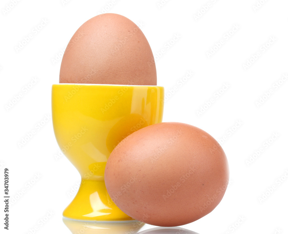 boiled eggs in yellow stand isolated on white boiled eggs in yellow stand isolated on white