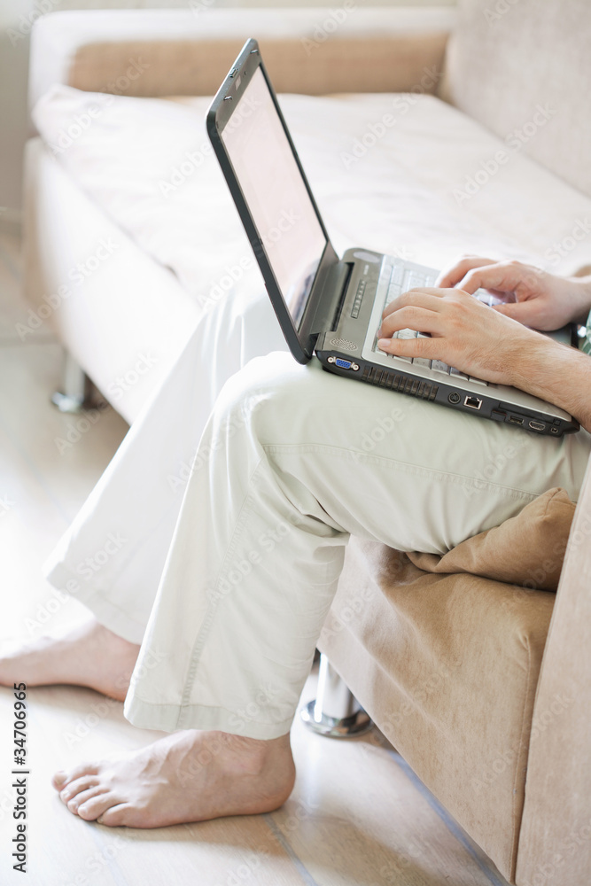 Naklejka premium man with laptop