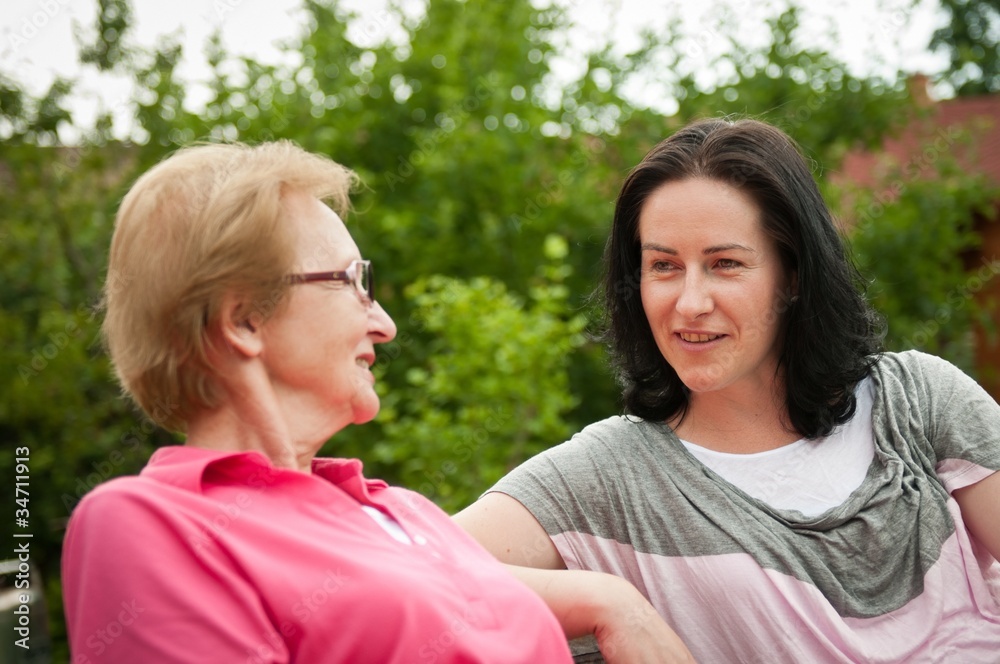 Outdoors talking - women