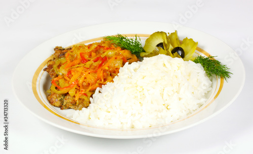 Fired meat, white rice and vegetables