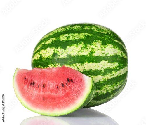 ripe watermelon and slice isolated on white