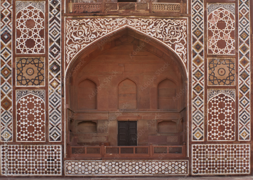 Front of arched gate at Akbar tomb in India's Agra.