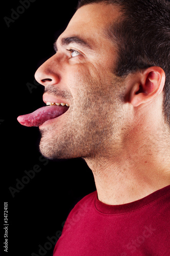 male man with tongue out