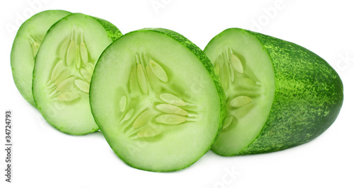 Sliced cucumber over white background