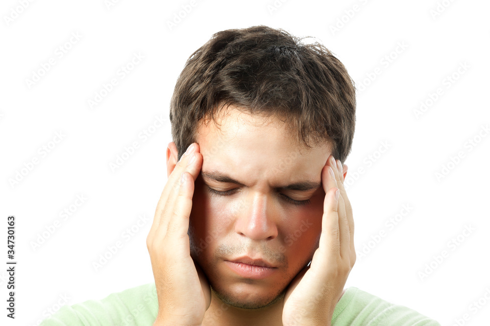 young man suffering from a headache isolated on white background young man suffering from a headache isolated on white background