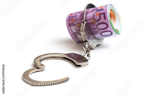 Handschellen und Euro Banknoten