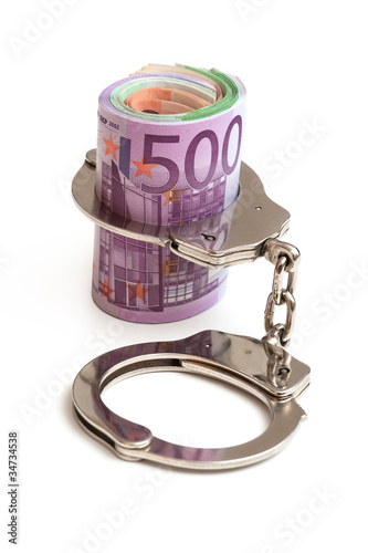 Handschellen und Euro Banknoten photo