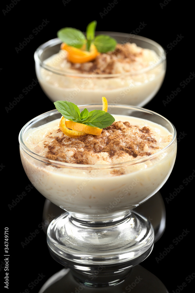 Rice pudding with cinnamon, orange peel and mint leaf Rice pudding with cinnamon, orange peel and mint leaf
