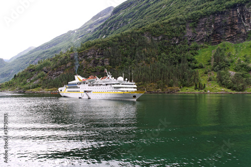Ship in norwegian fjord. © Janis Smits