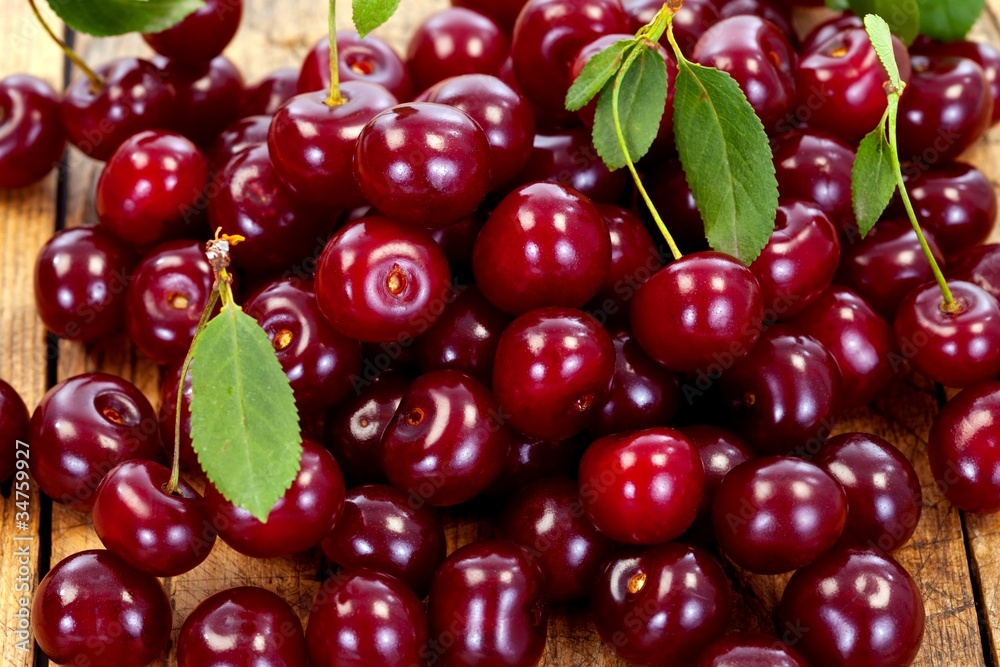 Cherries on wooden table