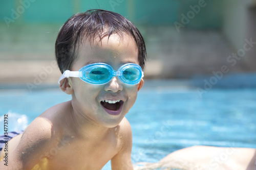 happy asian kid in swimming pool © Tom Wang