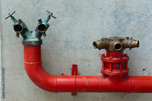 Three red water valves
