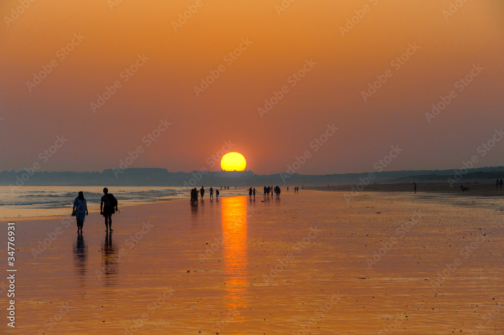 Orange sunset on the long beach