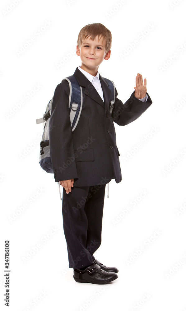 Schoolboy sitting on books Schoolboy sitting on books