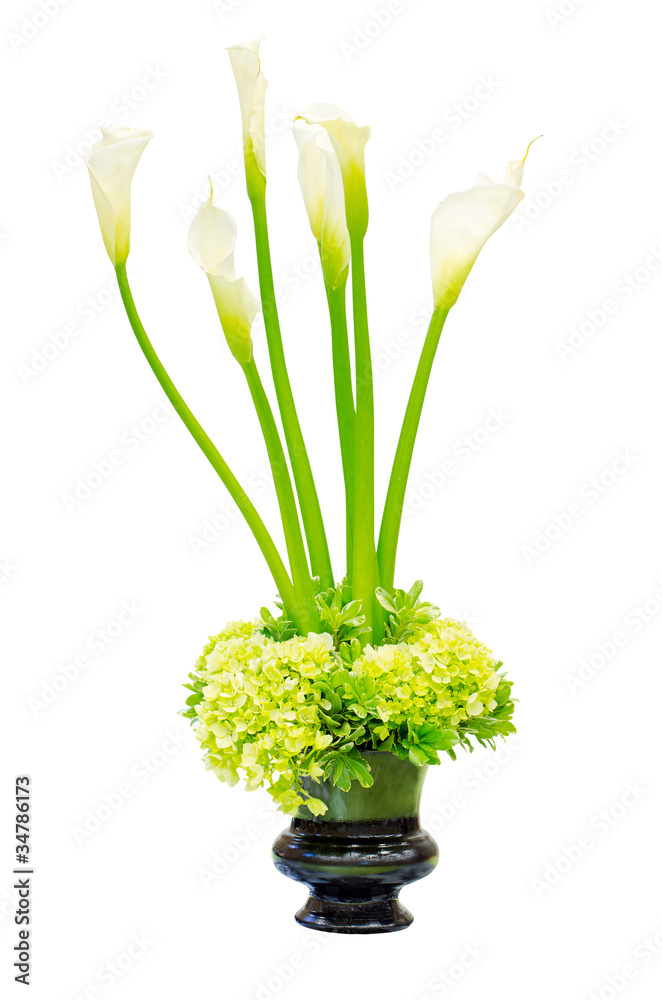 Fototapeta premium Wedding flower arrangement centerpiece in urn