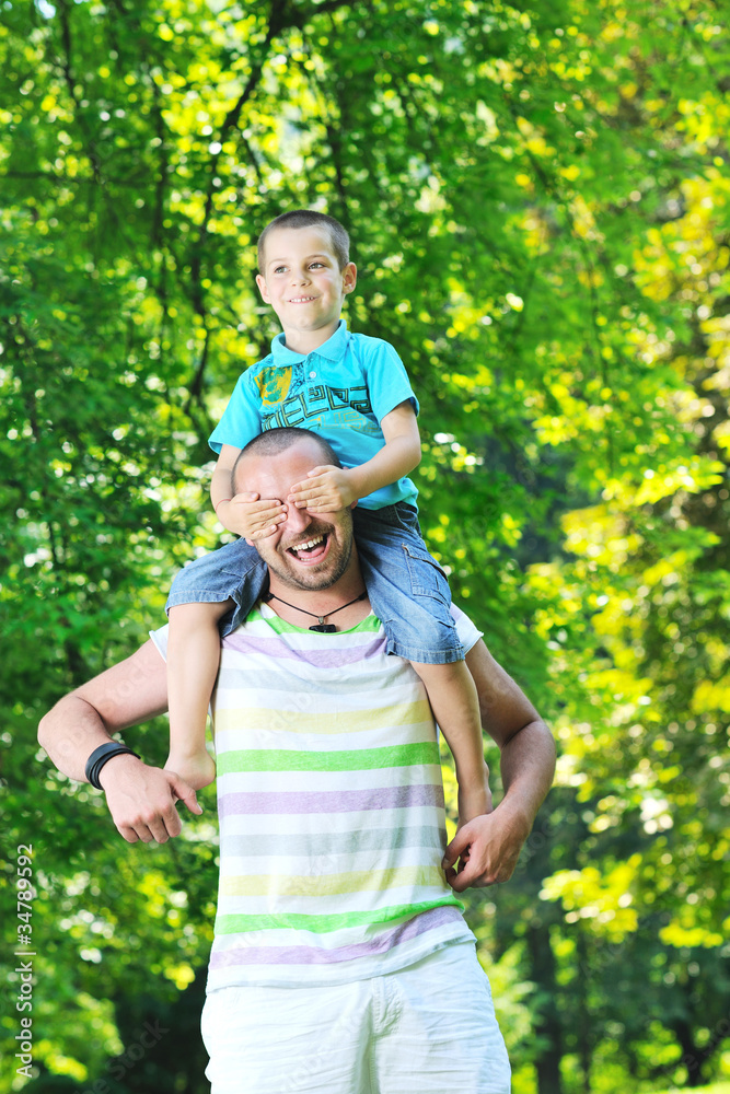 Fototapeta premium happy father and son have fun at park
