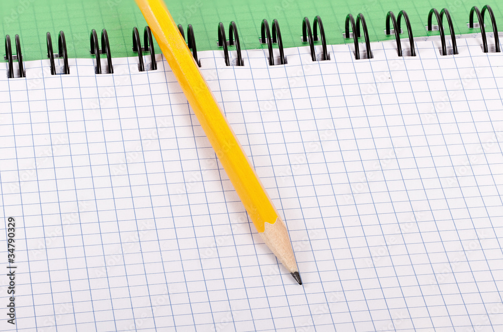 Pencil and notebook. Pencil and notebook.