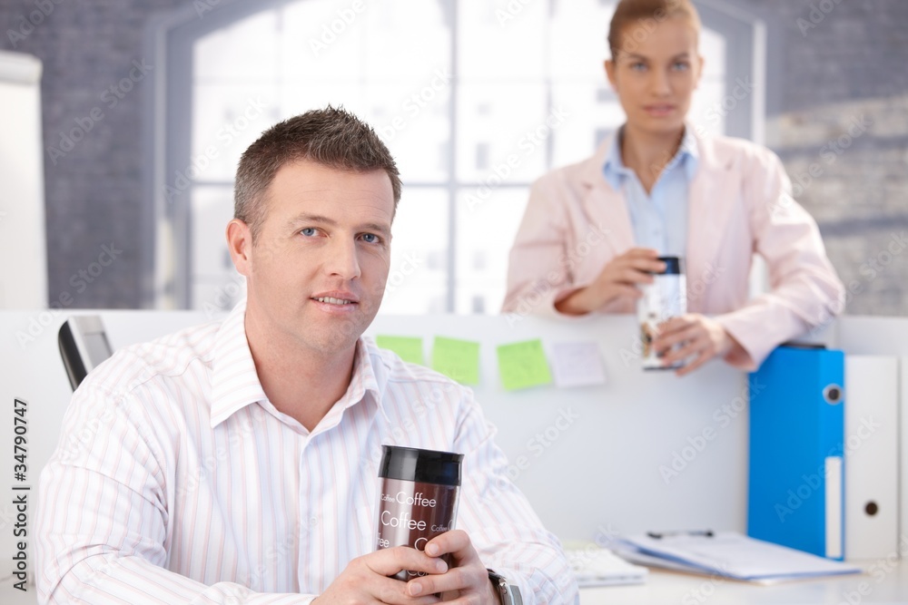 Casual office workers having break Casual office workers having break