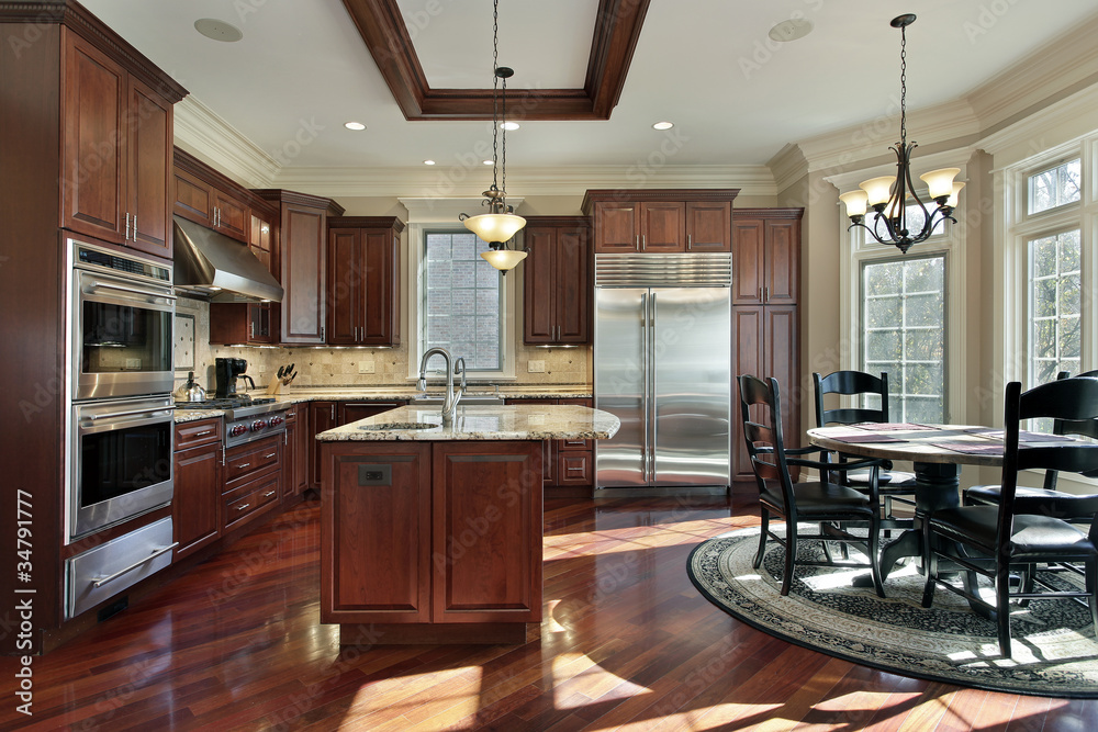 Fototapeta premium Luxury kitchen with cherry wood cabinetry