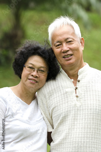 asian senior couple outdoor portrait