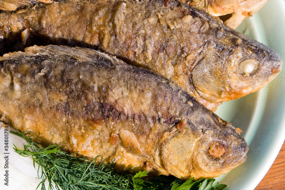 Fried fish carp in plate Fried fish carp in plate