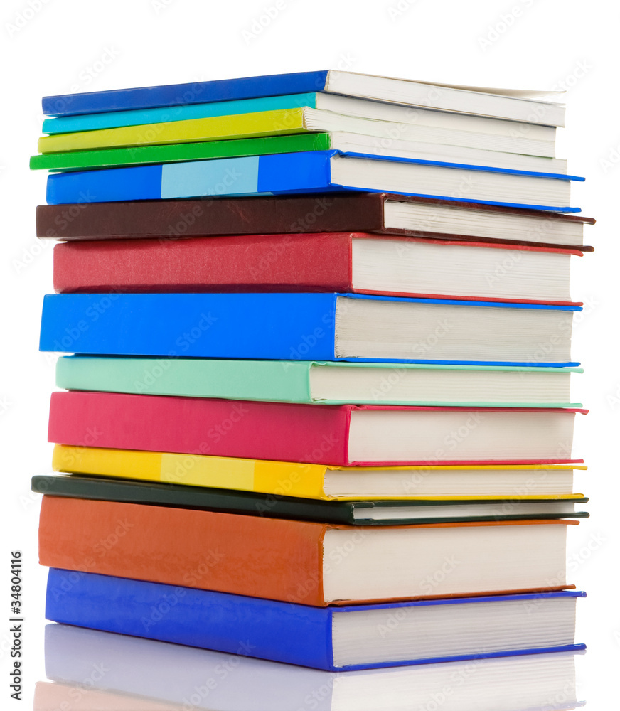 pile of new books isolated on white pile of new books isolated on white
