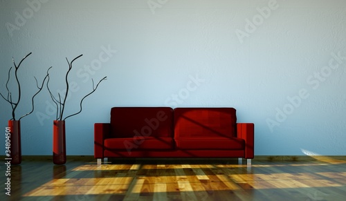 Wohndesign - rotes Sofa vor weisser Wand photo