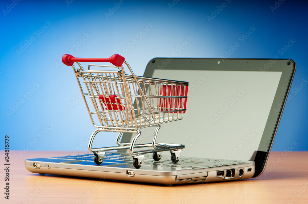Internet online shopping concept with computer and cart