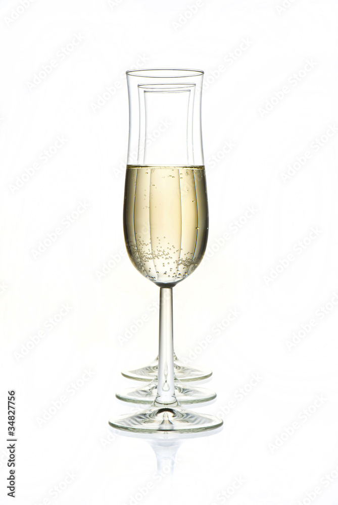 glasses with champagne isolated on white