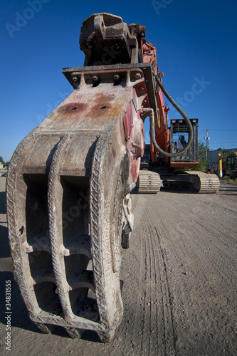 Excavator with Crusher Attachment