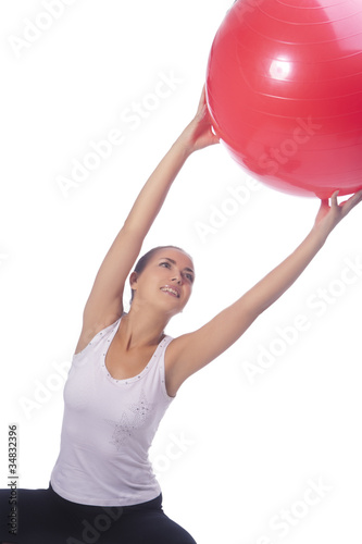 young caucasian girl making regular sport exercise,isolated