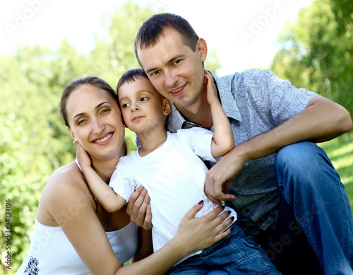 Family with two children in the summer park © Sergey Nivens