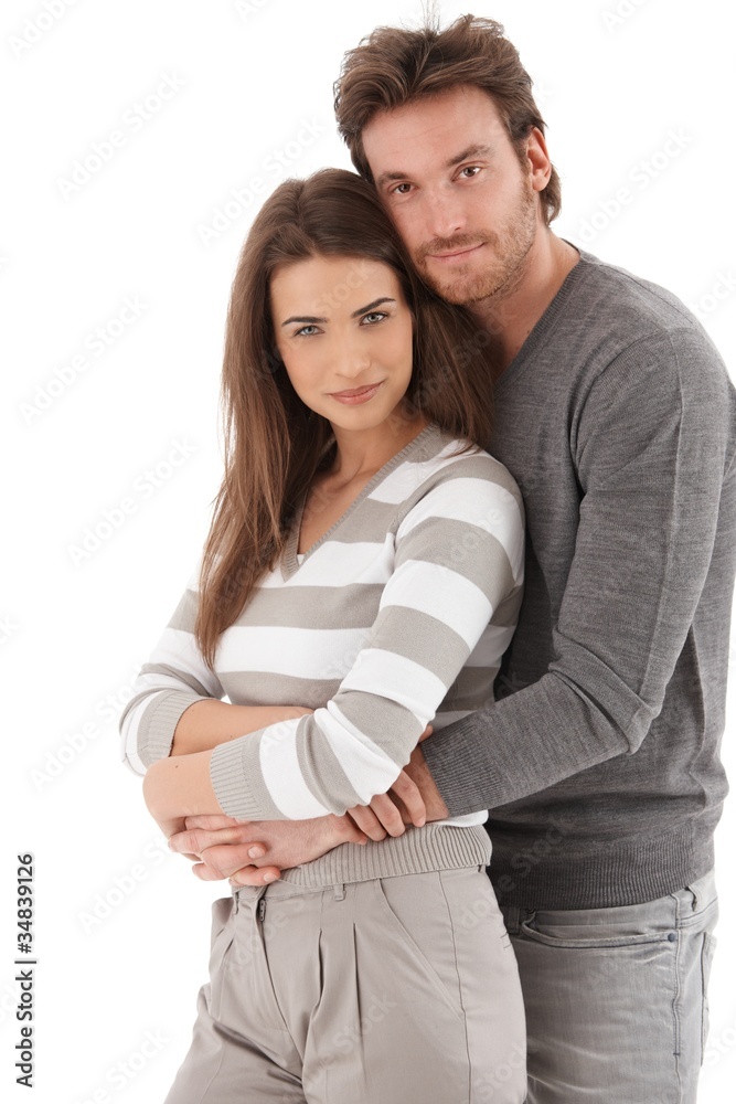 Portrait of attractive loving couple smiling