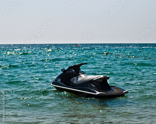 JetSki in the water . © LarisaP