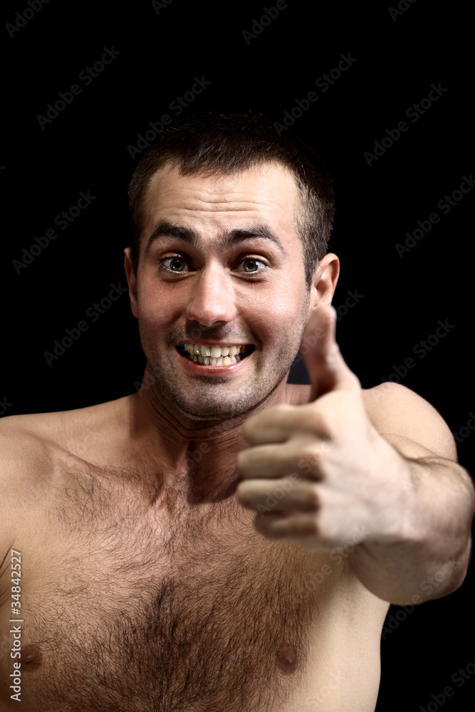 Fototapeta premium young man face expressions over black background