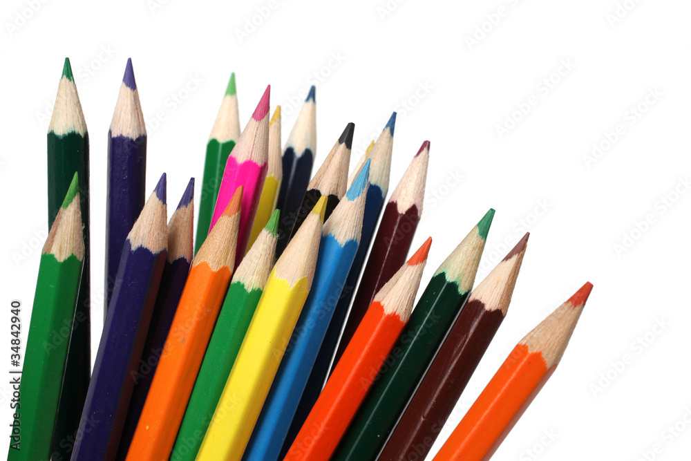 Many color pencils on a white background