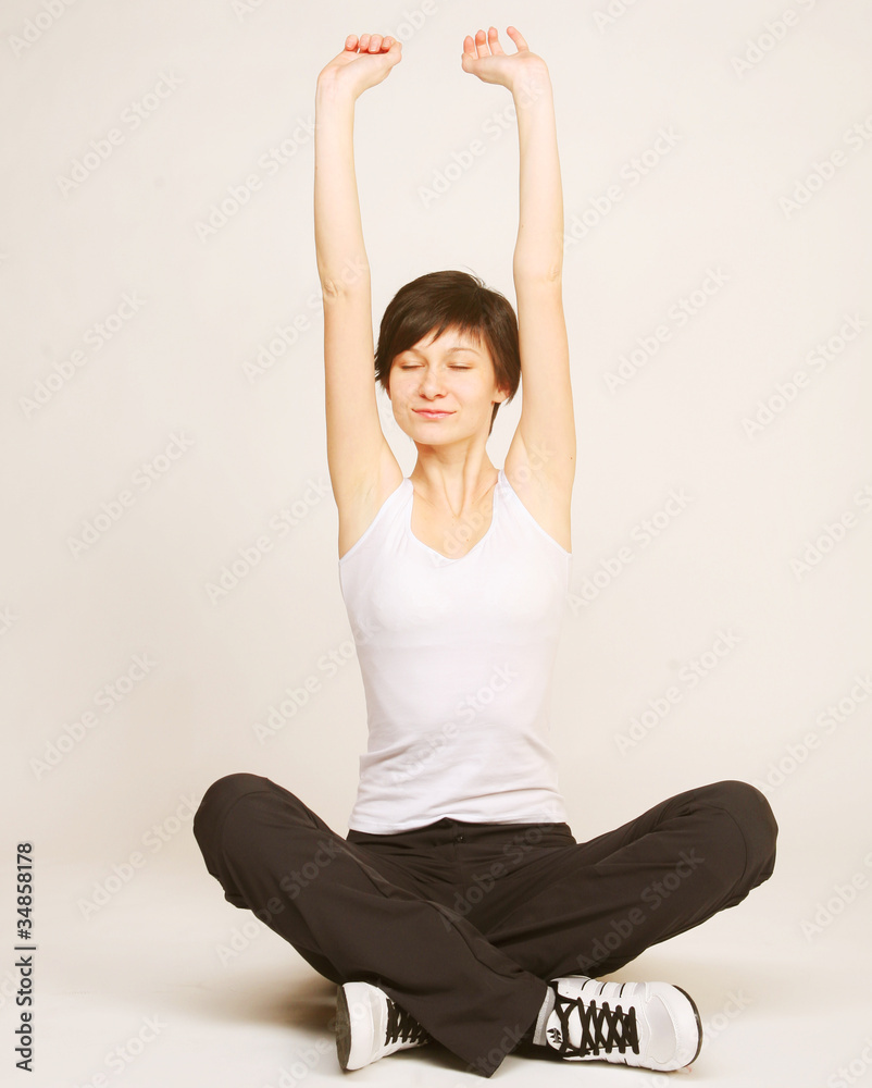 woman doing stretching exercise at the gym woman doing stretching exercise at the gym