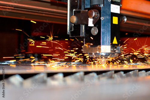 Industrial laser with sparks flying around